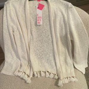 White Lilly Pulitzer short cardigan. Fring all around bottem